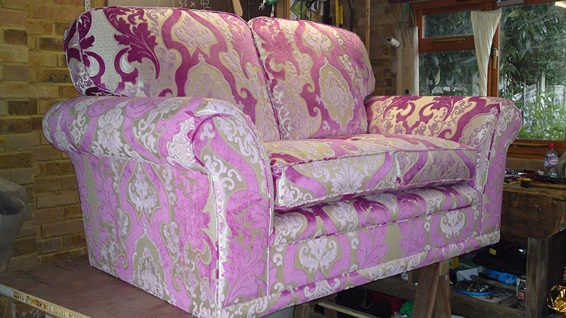 Sofa upholstered in paisley fabric