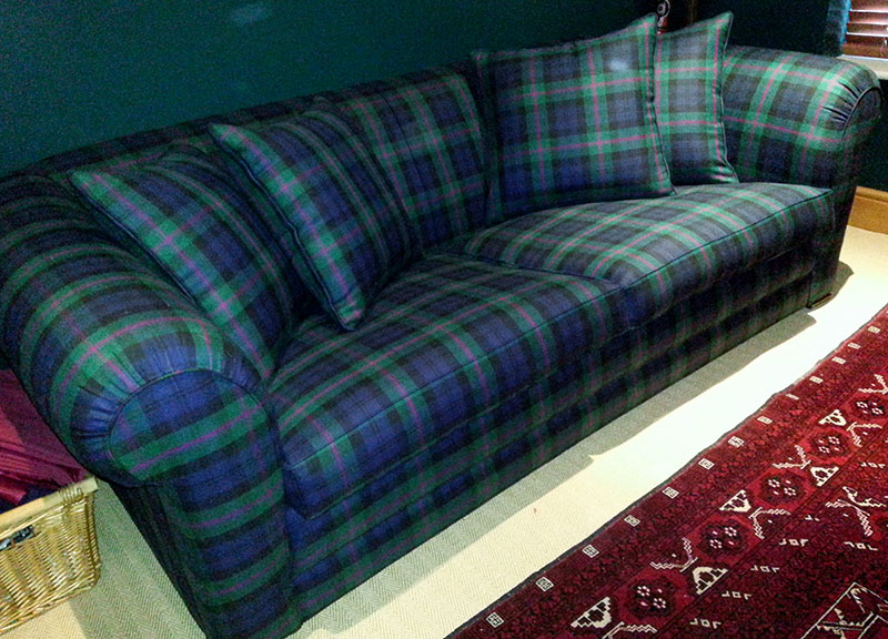 Sofa rennovated with tartan upholstery