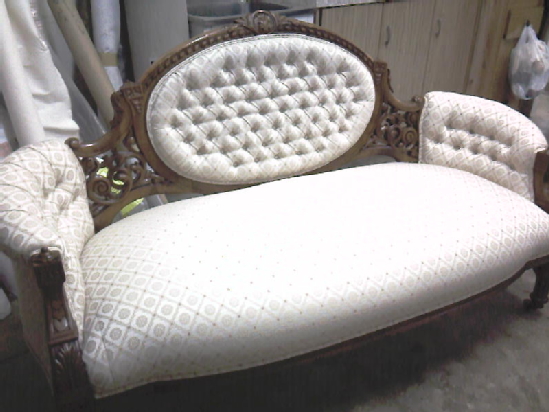 Reupholstered antique settee