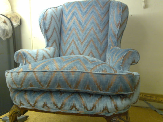 Antique arm chair, repadded and reupholstered