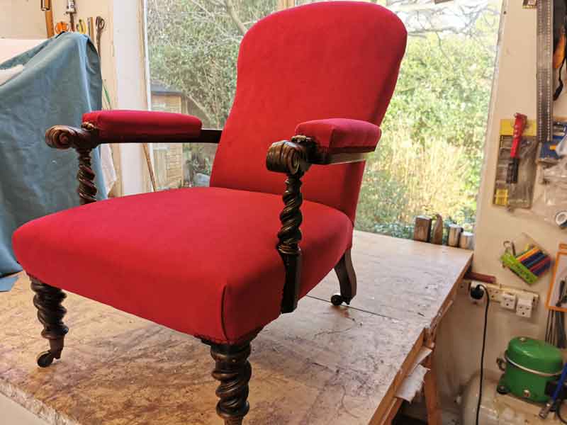Reupholstered scarlet arm chair